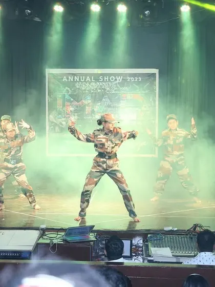 The stage fills with smoke as our "soldiers" strike a powerful pose in this patriotic act.