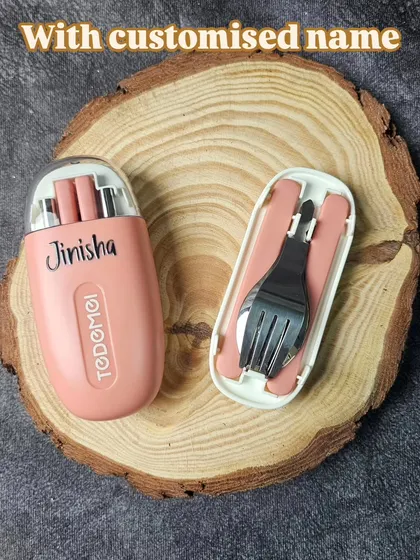 This portable cutlery set is a stylish and sustainable accessory for daily use. The compact case, shown here personalized with the name 'Jinisha', keeps the spoon, fork, and chopsticks clean and organized.
