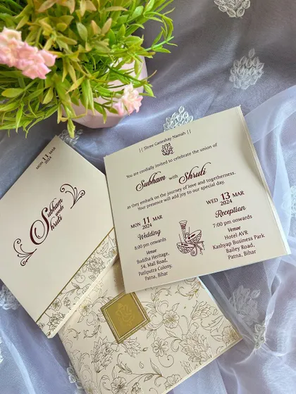 This invitation set includes inserts in both English and Hindi, catering to all your guests. The design is simple, elegant, and traditional.