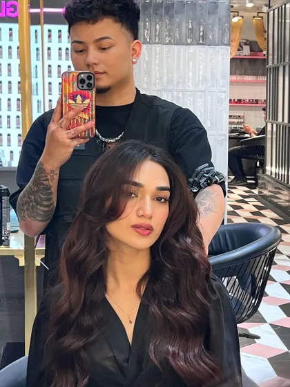 A new hairstyle and a new attitude to match. This client is glowing with her fresh cut and rich, dark color.