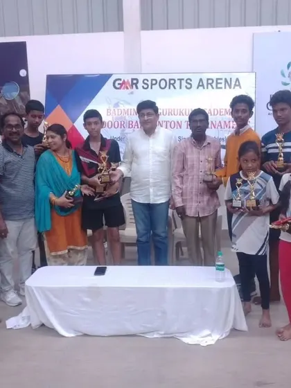 Our students from GMR Sports Arena receiving their awards at the annual Indoor Badminton Tournament.