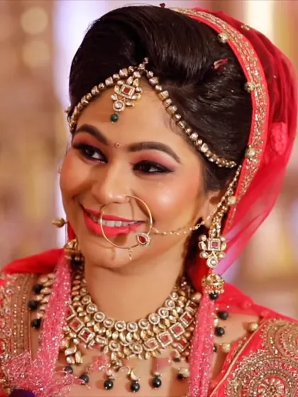 A smiling bridal portrait, capturing the joy and excitement of the wedding day.