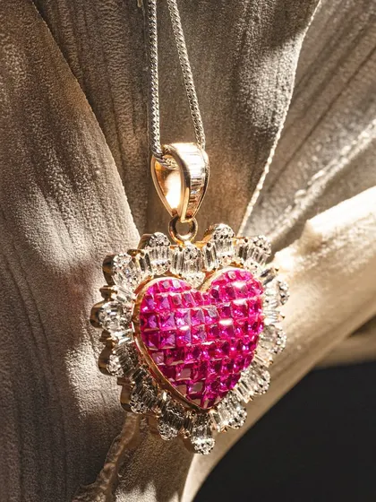 A close-up of our ruby heart pendant, a timeless symbol of love crafted with precision and passion.