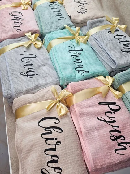A closer look at the beautiful calligraphy on our personalized towels. Each one is carefully crafted to be a special and useful gift.