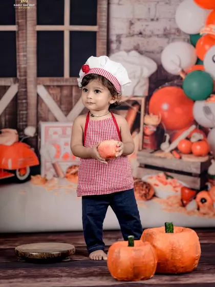 A new chef in town! Our little chef theme is so much fun, with a chef's hat, apron, and plenty of toy fruits and vegetables to play with.