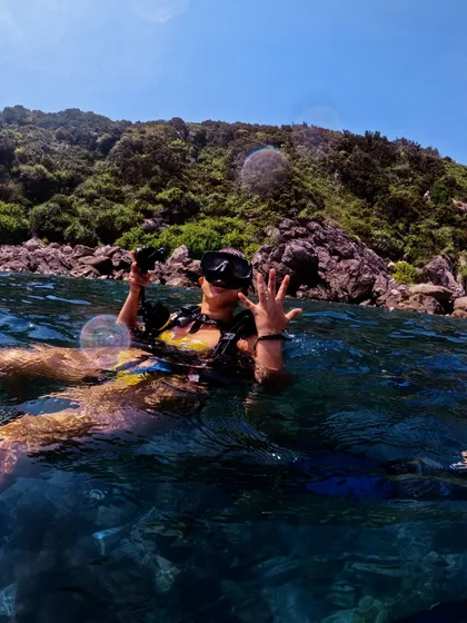 Getting ready for a scuba dive in Vietnam. Staying active keeps me ready for any physical challenge, on land or in the water.