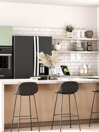 This image is part of a minimal bedroom design, showcasing the clean lines of the kitchen cabinetry in the same project. The light green and wood combination is fresh and modern.