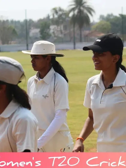 Players walking on the field, showcasing the relaxed yet focused atmosphere of the tournament.