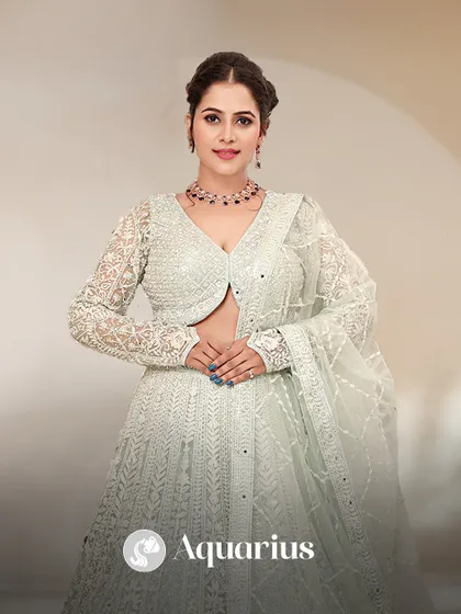 Aquarius, your style is unique and forward-thinking. This ethereal white lehenga with full-sleeve lacework is a perfect match for your individualistic nature.