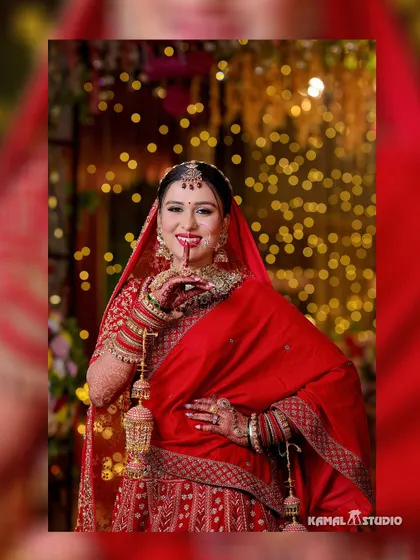 A happy portrait of the bride, her smile lighting up the frame, with beautiful bokeh in the background.