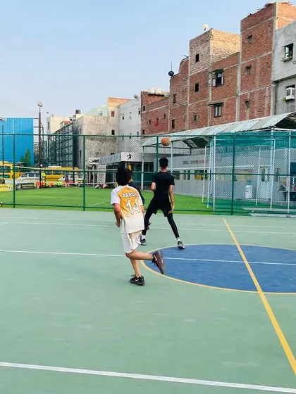 Players running the court, demonstrating the fast-paced nature of our training.