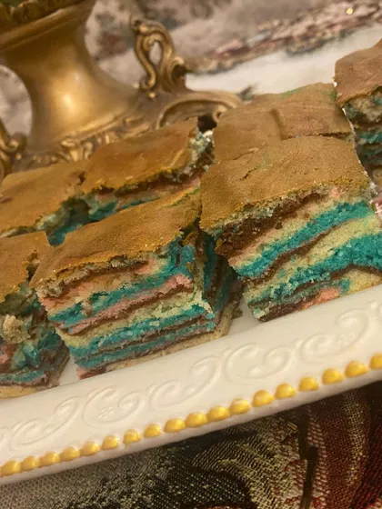Slices of my super moist and delicious ribbon cake, a fluffy and yummy treat perfect with tea.