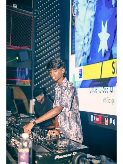Mixing in front of a large VJ screen. This shows how I integrate visuals directly into my performance.