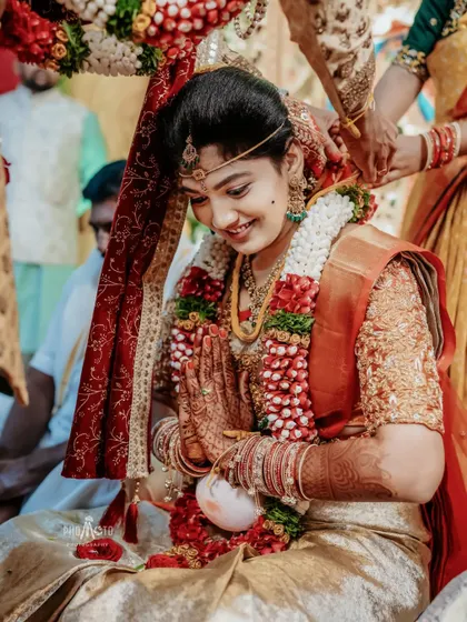 The bride in a moment of prayer and gratitude during her wedding ceremony.