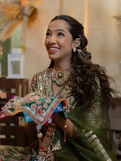 The bride during a traditional ceremony, her hair looking flawless.