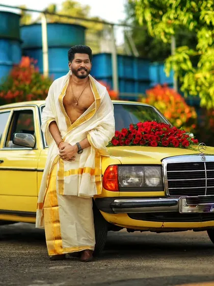 A classic shot of actor Chandhu Nair for his wedding. We gave him a traditional Kerala groom look, complete with a classic mundu and a confident style.