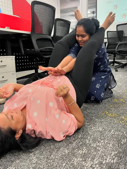 Participants practicing a ground escape from a mounted position. This is a crucial skill for self-defense.