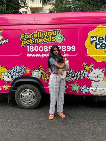 Here is Elvis with his pet parent after his grooming session. A happy, clean pet makes for a very happy owner, and we're proud to deliver that convenience.