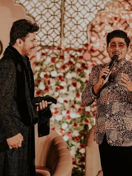 A candid shot of me interacting with guests during a reception. Making personal connections is key to creating a warm and inclusive atmosphere.