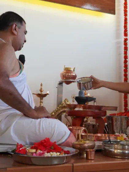 Another view of the Rudraabhishekham ceremony, showing the traditional setup and offerings.