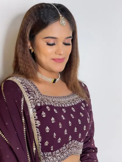A smiling shot from the same series, showing how a natural makeup look can still be incredibly beautiful and camera-ready.