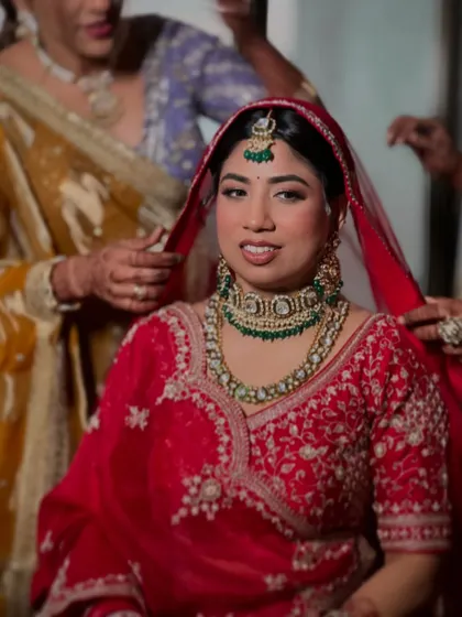 Helping my bride Hiral with her dupatta. These getting ready moments are so special, and I love being a part of them.