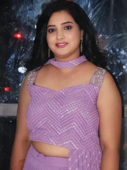 Ashritha looking lovely in a modern lavender lehenga for a party. Her makeup is kept fresh and simple to complement the outfit.