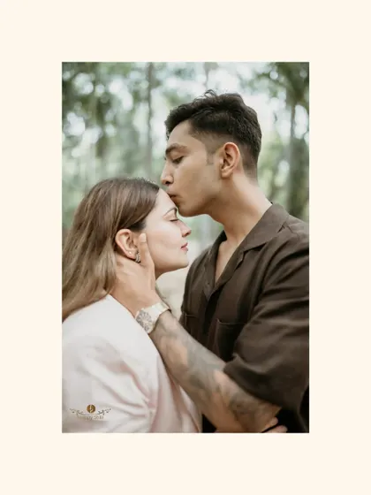 An intimate close-up of a gentle forehead kiss, focusing on the tender connection between the couple. This highlights my love for capturing the quiet, heartfelt moments that often mean the most.