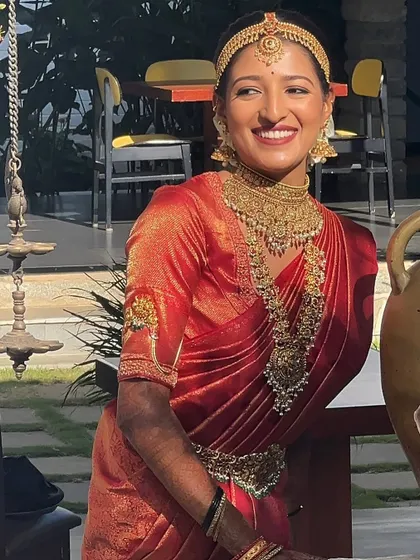 The sunlight catching the bride's smile highlights the beautiful, natural-looking skin finish. I teach techniques to ensure makeup looks great in all lighting conditions, from indoor ceremonies to outdoor photoshoots.