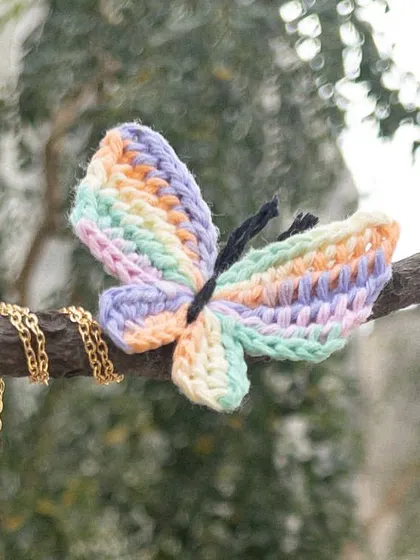The 'Titli' necklace in the bestselling multi-color pastel. It's a beautiful, delicate piece that's perfect for gifting.