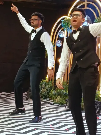The groom's side bringing their A-game with a perfectly synchronized dance performance. I love seeing families come together to create these fun and memorable moments on the Sangeet stage.