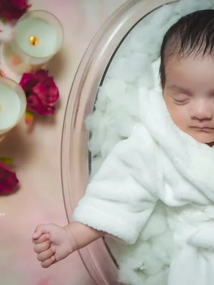 A different angle from the 'Spa Day' shoot, showing the baby's peaceful expression. These themed shoots are designed to be both creative and completely safe for your little one.