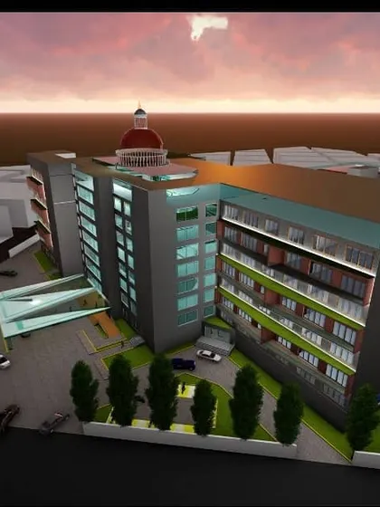 An overhead 3D visualization of the complete hotel property, showing its footprint, parking layout, and relationship to the surrounding area.