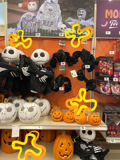 Getting into the Halloween spirit with some spooky-cute decor and orange doodles.