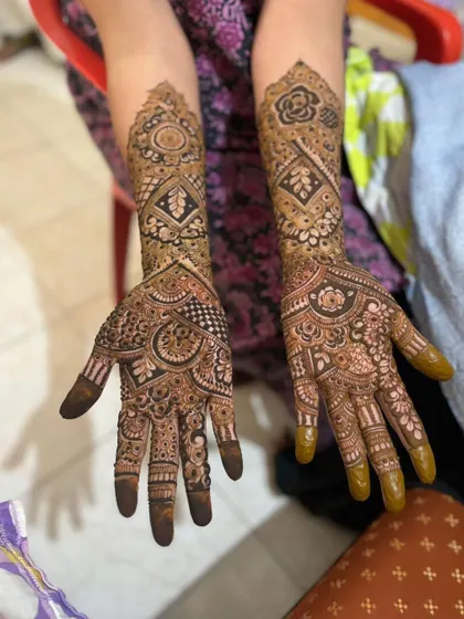 This is a detailed view of my intricate bridal henna work. Each design is unique, combining traditional patterns like paisleys and mandalas with fine-line fillers to create a stunning, full-coverage look for your special day.