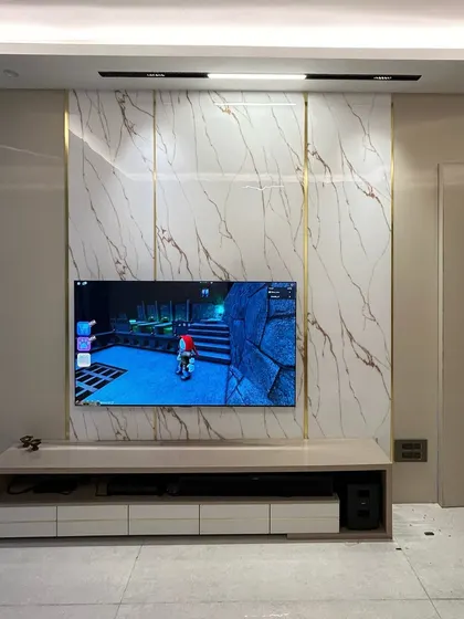 Another angle of the completed TV unit, demonstrating the quality of the finish and the precision of the installation.