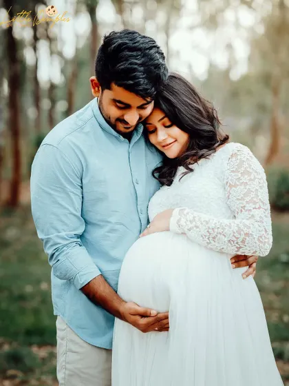A classic, loving embrace surrounded by the beauty of nature. This outdoor couple's portrait is filled with warmth and tenderness.