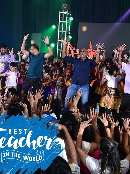 Happy Teacher's Day to our incredible faculty. This photo captures our instructors celebrating with students on stage, a testament to their dedication.