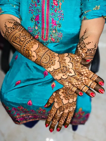 A full view of the dome design, showing how it extends up the arm with complementary patterns.