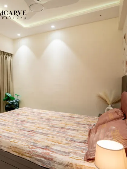 A different perspective of the bedroom, showing the clean lines and calm colors that promote peace.
