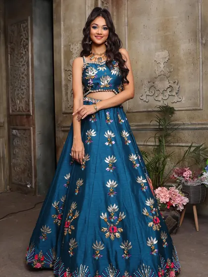 The full-length shot of the blue lehenga look. Your portfolio will feature these complete, styled images.