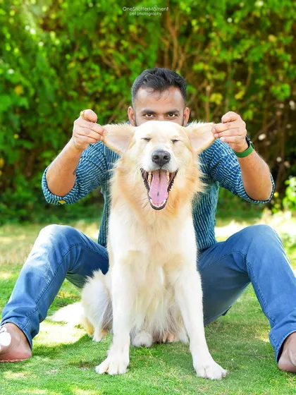 A big yawn or a mighty roar? Either way, this candid moment from our "dads and dogs" shoot is full of personality and fun.