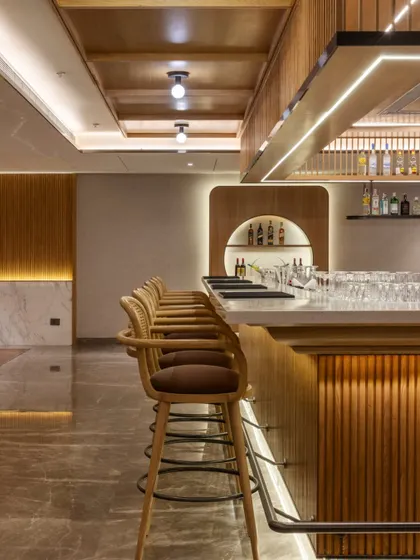 Additional views of the Radisson Resort, Khopoli, showcasing various interior and exterior details, from lobby seating areas and restaurant layouts to guest room configurations and architectural elements.