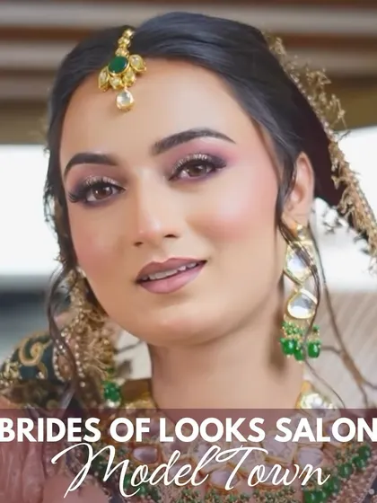 A close-up portrait of our bride, emphasizing the soft glam makeup. The look features shimmery pink eyeshadow, rosy cheeks, and a natural lip color, perfect for a daytime wedding ceremony.