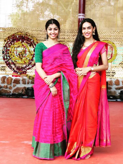 Dressed in a traditional pink saree for a cultural event in Bengaluru.