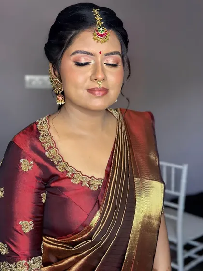 A close-up of the eye makeup. I used soft, neutral shimmers to create a look that is elegant and timeless, allowing her natural beauty to be the focus.