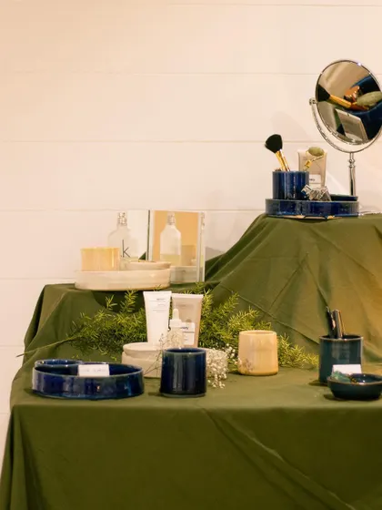 A beautiful display of bathroom accessories, including trays, toothbrush holders, and soap dishes, all handmade by our students. Why settle for boring when you can have handmade?