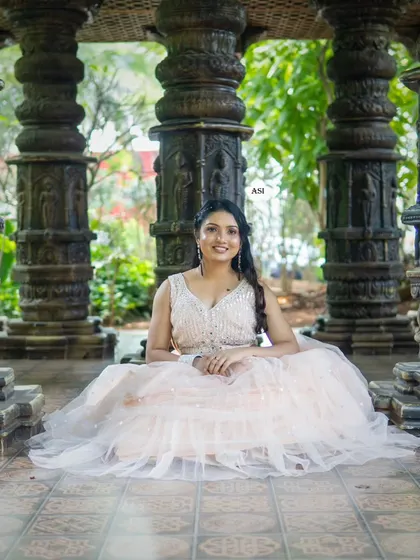 Another shot from the same photoshoot, showcasing the delicate beadwork on the blouse and the full, dreamy skirt of the lehenga.