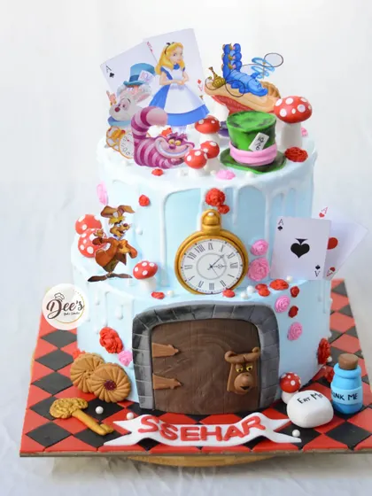 The full two-tier Alice in Wonderland cake, a feast for the eyes with characters and elements from the classic tale.