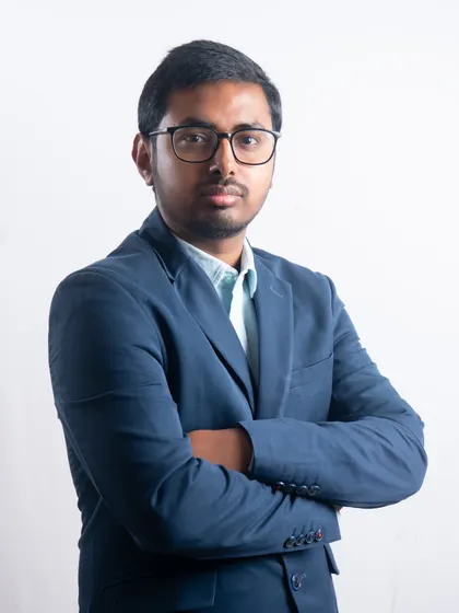 Our studio sessions offer great versatility. Here, we used a clean white background and a confident pose to create a sharp, modern professional portrait that stands out. We work with you to find the pose and backdrop that best represents your brand.